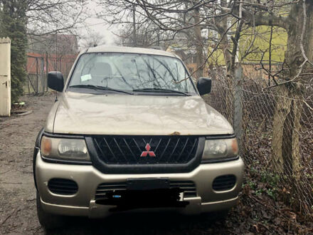 Серый Мицубиси Паджеро Спорт, объемом двигателя 3 л и пробегом 300 тыс. км за 6500 $, фото 1 на Automoto.ua