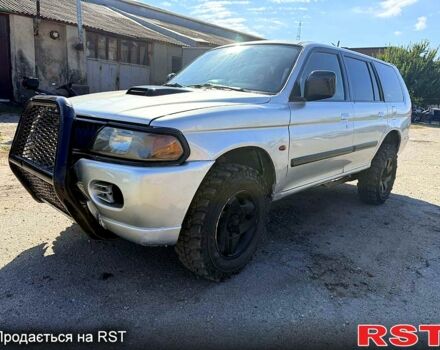 Серый Мицубиси Паджеро Спорт, объемом двигателя 2.5 л и пробегом 267 тыс. км за 3500 $, фото 1 на Automoto.ua