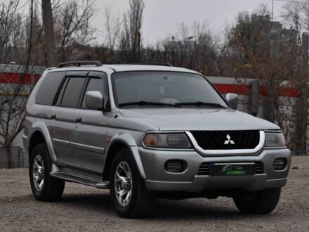 Серый Мицубиси Паджеро Спорт, объемом двигателя 3 л и пробегом 240 тыс. км за 6450 $, фото 1 на Automoto.ua