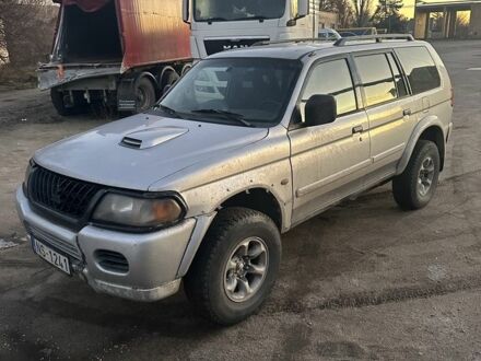 Серый Мицубиси Паджеро Спорт, объемом двигателя 2.5 л и пробегом 252 тыс. км за 2000 $, фото 1 на Automoto.ua