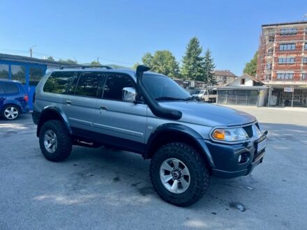 Серый Мицубиси Паджеро Спорт, объемом двигателя 3 л и пробегом 253 тыс. км за 2850 $, фото 1 на Automoto.ua