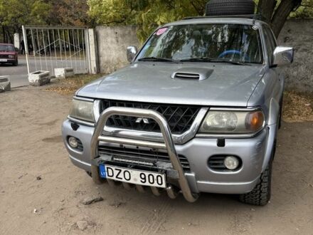 Серый Мицубиси Паджеро Спорт, объемом двигателя 2.5 л и пробегом 283 тыс. км за 7000 $, фото 1 на Automoto.ua
