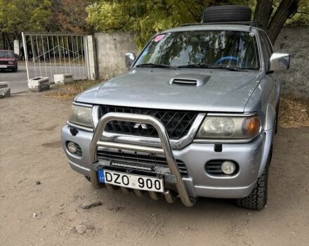 Серый Мицубиси Паджеро Спорт, объемом двигателя 2.5 л и пробегом 283 тыс. км за 7000 $, фото 1 на Automoto.ua