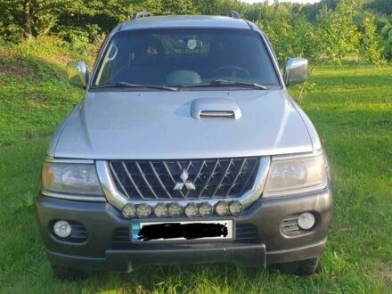 Серый Мицубиси Паджеро Спорт, объемом двигателя 2.5 л и пробегом 235 тыс. км за 8800 $, фото 1 на Automoto.ua