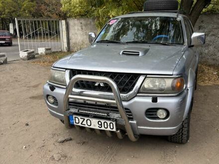 Серый Мицубиси Паджеро Спорт, объемом двигателя 2.5 л и пробегом 283 тыс. км за 5000 $, фото 1 на Automoto.ua