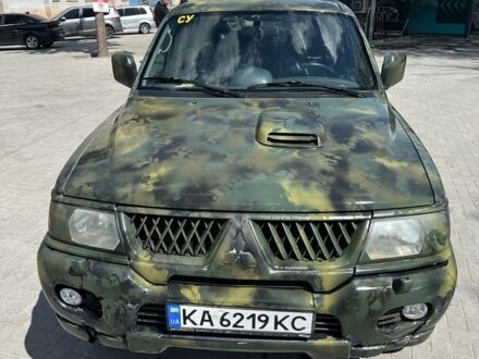 Сірий Міцубісі Паджеро Спорт, об'ємом двигуна 2.5 л та пробігом 300 тис. км за 6500 $, фото 1 на Automoto.ua