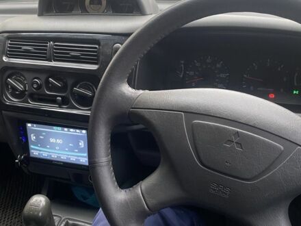 Серый Мицубиси Паджеро Спорт, объемом двигателя 2.5 л и пробегом 118 тыс. км за 5000 $, фото 1 на Automoto.ua