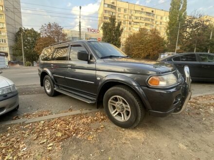 Сірий Міцубісі Паджеро Спорт, об'ємом двигуна 3 л та пробігом 220 тис. км за 9100 $, фото 1 на Automoto.ua
