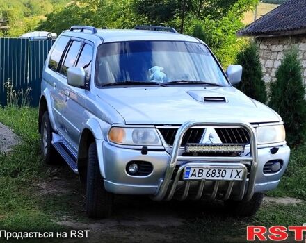 Сірий Міцубісі Паджеро Спорт, об'ємом двигуна 2.5 л та пробігом 280 тис. км за 10000 $, фото 1 на Automoto.ua