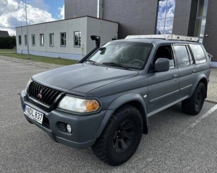 Сірий Міцубісі Паджеро Спорт, об'ємом двигуна 2.5 л та пробігом 210 тис. км за 3539 $, фото 1 на Automoto.ua