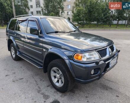Серый Мицубиси Паджеро Спорт, объемом двигателя 3 л и пробегом 240 тыс. км за 9499 $, фото 1 на Automoto.ua
