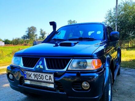 Серый Мицубиси Паджеро Спорт, объемом двигателя 2.5 л и пробегом 186 тыс. км за 10700 $, фото 1 на Automoto.ua