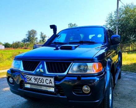 Серый Мицубиси Паджеро Спорт, объемом двигателя 2.5 л и пробегом 186 тыс. км за 10700 $, фото 1 на Automoto.ua