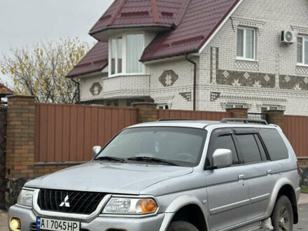Серый Мицубиси Паджеро Спорт, объемом двигателя 3 л и пробегом 235 тыс. км за 8400 $, фото 1 на Automoto.ua