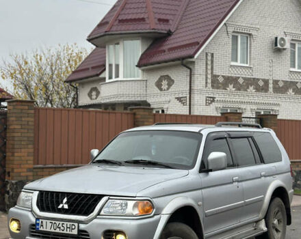 Серый Мицубиси Паджеро Спорт, объемом двигателя 3 л и пробегом 235 тыс. км за 8400 $, фото 1 на Automoto.ua