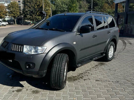 Серый Мицубиси Паджеро Спорт, объемом двигателя 2.48 л и пробегом 225 тыс. км за 13200 $, фото 1 на Automoto.ua