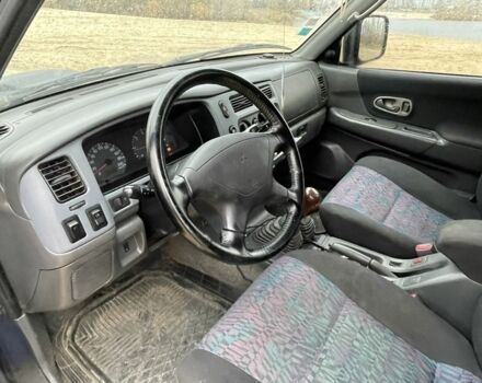 Синий Мицубиси Паджеро Спорт, объемом двигателя 2.5 л и пробегом 320 тыс. км за 4400 $, фото 10 на Automoto.ua