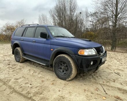 Синий Мицубиси Паджеро Спорт, объемом двигателя 2.5 л и пробегом 320 тыс. км за 4400 $, фото 5 на Automoto.ua