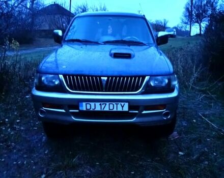 Синий Мицубиси Паджеро Спорт, объемом двигателя 2.5 л и пробегом 310 тыс. км за 4500 $, фото 4 на Automoto.ua