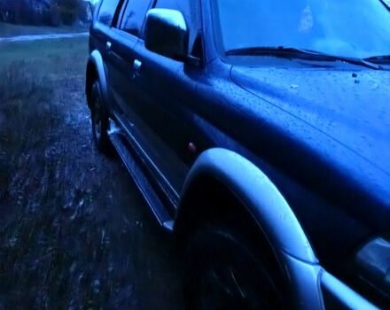 Синий Мицубиси Паджеро Спорт, объемом двигателя 2.5 л и пробегом 310 тыс. км за 4500 $, фото 2 на Automoto.ua