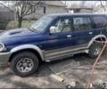 Синий Мицубиси Паджеро Спорт, объемом двигателя 2.5 л и пробегом 400 тыс. км за 4000 $, фото 1 на Automoto.ua
