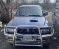 Синий Мицубиси Паджеро Спорт, объемом двигателя 2.5 л и пробегом 400 тыс. км за 4000 $, фото 1 на Automoto.ua