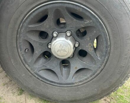 Синій Міцубісі Паджеро Спорт, об'ємом двигуна 2 л та пробігом 256 тис. км за 6000 $, фото 7 на Automoto.ua