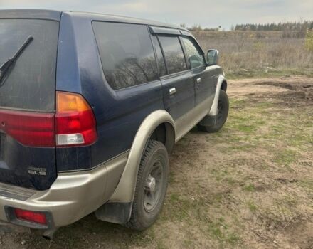 Синій Міцубісі Паджеро Спорт, об'ємом двигуна 2 л та пробігом 256 тис. км за 6000 $, фото 3 на Automoto.ua