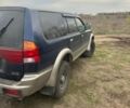 Синій Міцубісі Паджеро Спорт, об'ємом двигуна 2 л та пробігом 256 тис. км за 6000 $, фото 3 на Automoto.ua