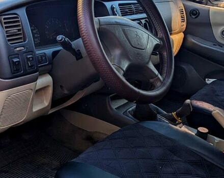 Синий Мицубиси Паджеро Спорт, объемом двигателя 3 л и пробегом 370 тыс. км за 8000 $, фото 7 на Automoto.ua