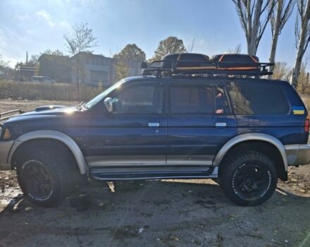 Синій Міцубісі Паджеро Спорт, об'ємом двигуна 2.5 л та пробігом 380 тис. км за 7999 $, фото 4 на Automoto.ua