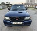 Синий Мицубиси Паджеро Спорт, объемом двигателя 2.5 л и пробегом 233 тыс. км за 3800 $, фото 2 на Automoto.ua