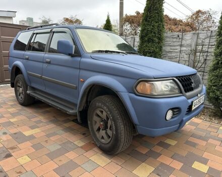 Синий Мицубиси Паджеро Спорт, объемом двигателя 3 л и пробегом 332 тыс. км за 6200 $, фото 2 на Automoto.ua