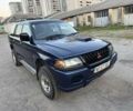 Синий Мицубиси Паджеро Спорт, объемом двигателя 2.5 л и пробегом 233 тыс. км за 3800 $, фото 3 на Automoto.ua