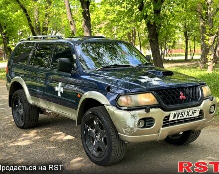 Синій Міцубісі Паджеро Спорт, об'ємом двигуна 2.5 л та пробігом 189 тис. км за 3700 $, фото 2 на Automoto.ua