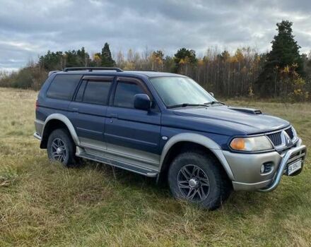 Синій Міцубісі Паджеро Спорт, об'ємом двигуна 3 л та пробігом 344 тис. км за 6800 $, фото 6 на Automoto.ua