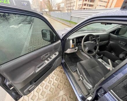 Синий Мицубиси Паджеро Спорт, объемом двигателя 2.5 л и пробегом 169 тыс. км за 8200 $, фото 11 на Automoto.ua