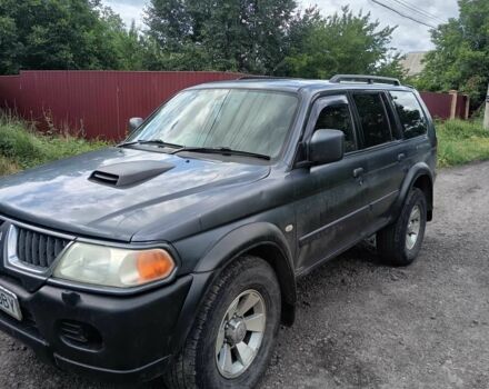 Синий Мицубиси Паджеро Спорт, объемом двигателя 2.5 л и пробегом 300 тыс. км за 4500 $, фото 2 на Automoto.ua