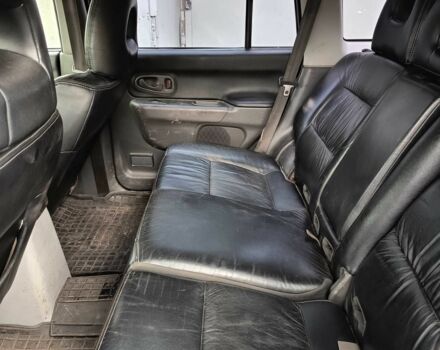 Синий Мицубиси Паджеро Спорт, объемом двигателя 2.5 л и пробегом 300 тыс. км за 4500 $, фото 11 на Automoto.ua