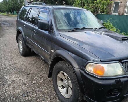 Синий Мицубиси Паджеро Спорт, объемом двигателя 2.5 л и пробегом 300 тыс. км за 4500 $, фото 1 на Automoto.ua