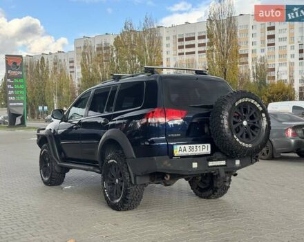 Синій Міцубісі Паджеро Спорт, об'ємом двигуна 2.48 л та пробігом 168 тис. км за 19999 $, фото 11 на Automoto.ua