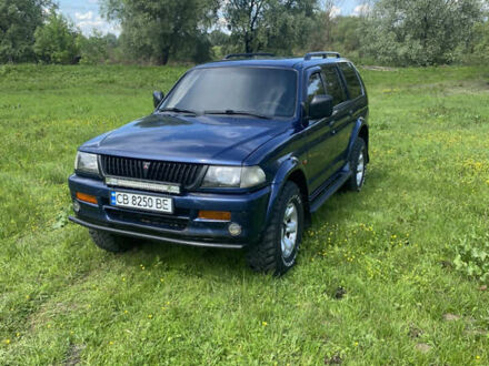 Міцубісі Паджеро Спорт 1999 у Новгород-Северском на Automoto.ua Синій Міцубісі Паджеро Спорт, об'ємом двигуна 3 л та пробігом 336 тис. км за 6500 $, фото 1 на Automoto.ua