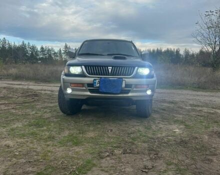 Синий Мицубиси Паджеро Спорт, объемом двигателя 2 л и пробегом 256 тыс. км за 6000 $, фото 1 на Automoto.ua