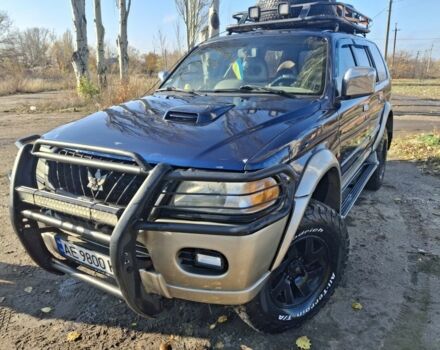 Синій Міцубісі Паджеро Спорт, об'ємом двигуна 2.5 л та пробігом 380 тис. км за 7999 $, фото 1 на Automoto.ua