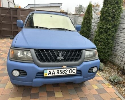 Синий Мицубиси Паджеро Спорт, объемом двигателя 3 л и пробегом 332 тыс. км за 6200 $, фото 1 на Automoto.ua