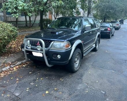 Синий Мицубиси Паджеро Спорт, объемом двигателя 2.5 л и пробегом 300 тыс. км за 5500 $, фото 1 на Automoto.ua