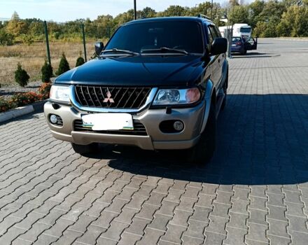 Синій Міцубісі Паджеро Спорт, об'ємом двигуна 3 л та пробігом 192 тис. км за 7850 $, фото 1 на Automoto.ua