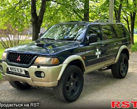 Синий Мицубиси Паджеро Спорт, объемом двигателя 2.5 л и пробегом 189 тыс. км за 3700 $, фото 1 на Automoto.ua