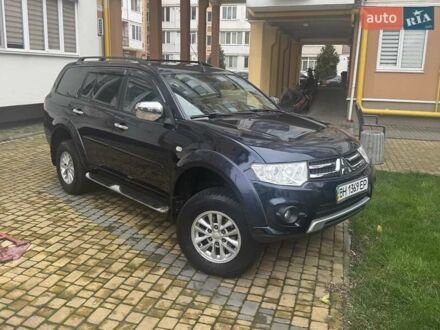 Синий Мицубиси Паджеро Спорт, объемом двигателя 2.5 л и пробегом 160 тыс. км за 13900 $, фото 1 на Automoto.ua