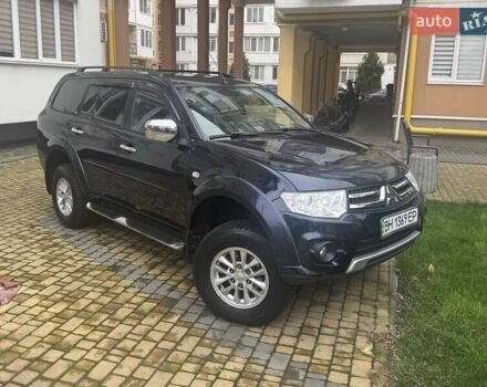 Синий Мицубиси Паджеро Спорт, объемом двигателя 2.5 л и пробегом 160 тыс. км за 13900 $, фото 1 на Automoto.ua